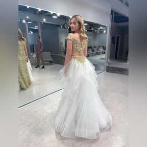 Size 2 Sherri Hill purchased at Dressing Dreams. White train is detachable.